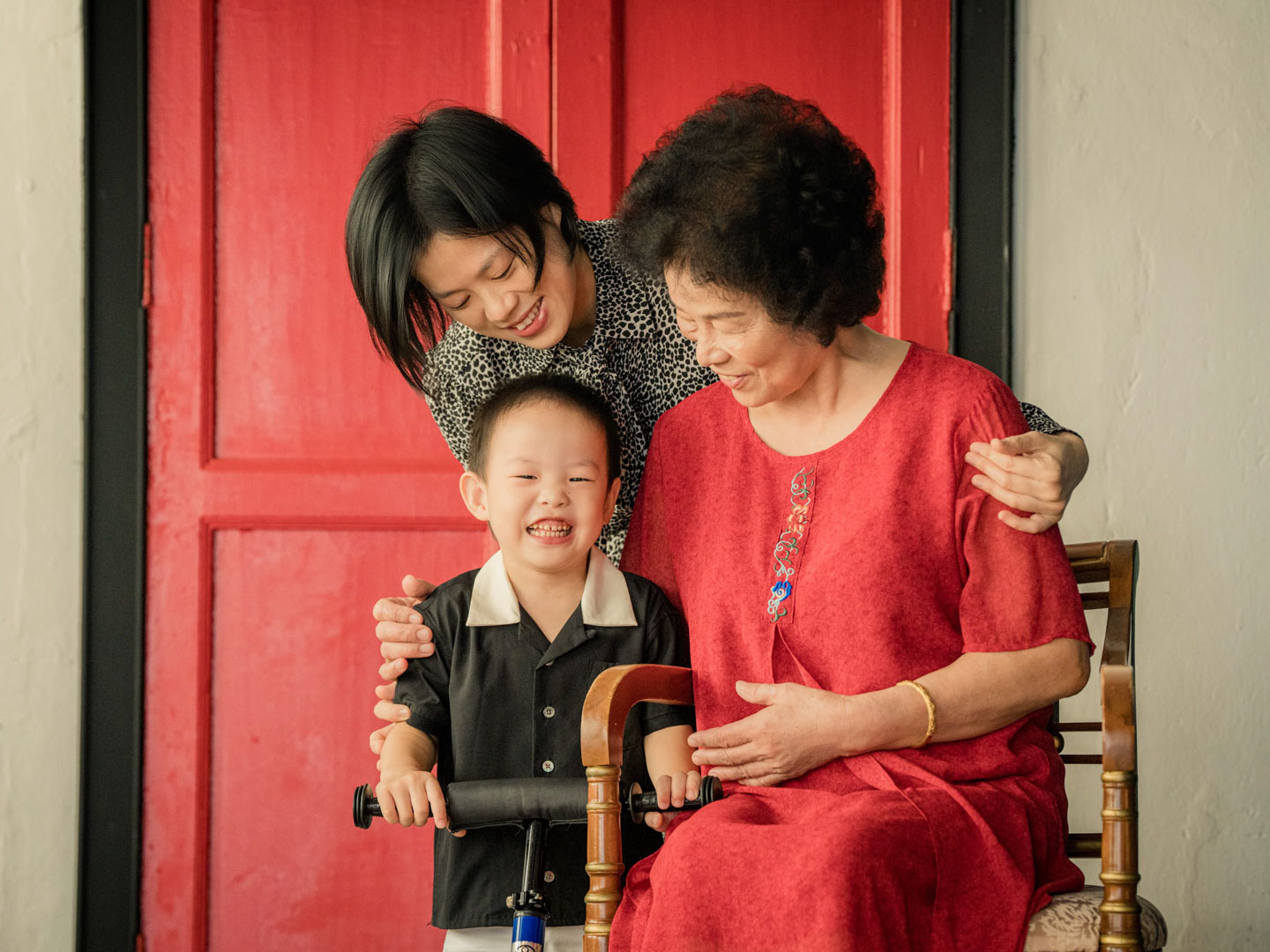 Grandma, mum with son at White Room Studio natural light photography studio, 219 River Valley Road, Singapore. Safe gentle newborn photoshoot 2026.