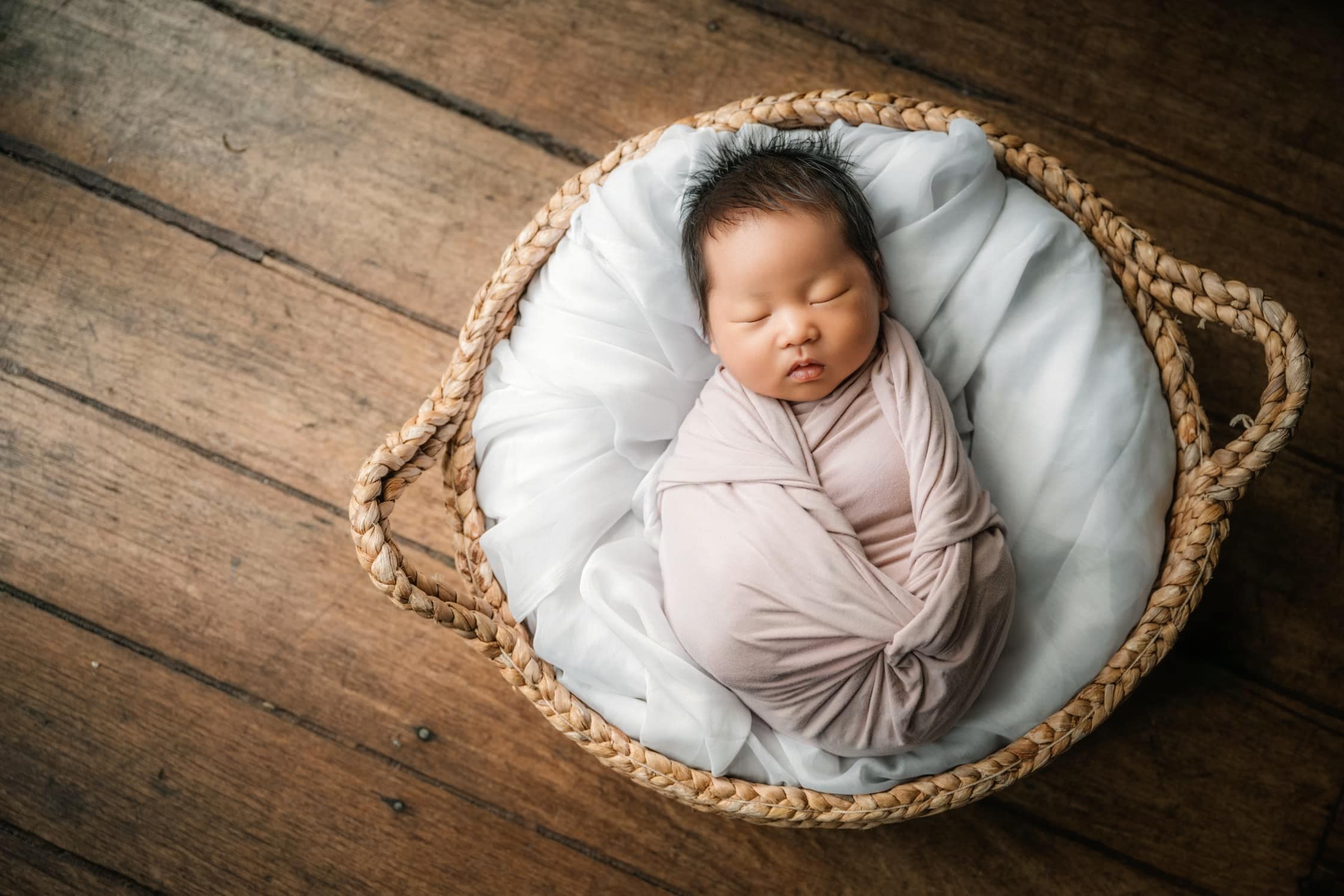 Newborn photoshoot in natural light photo studio at White Room Studio, 219 River Valley Road Singapore