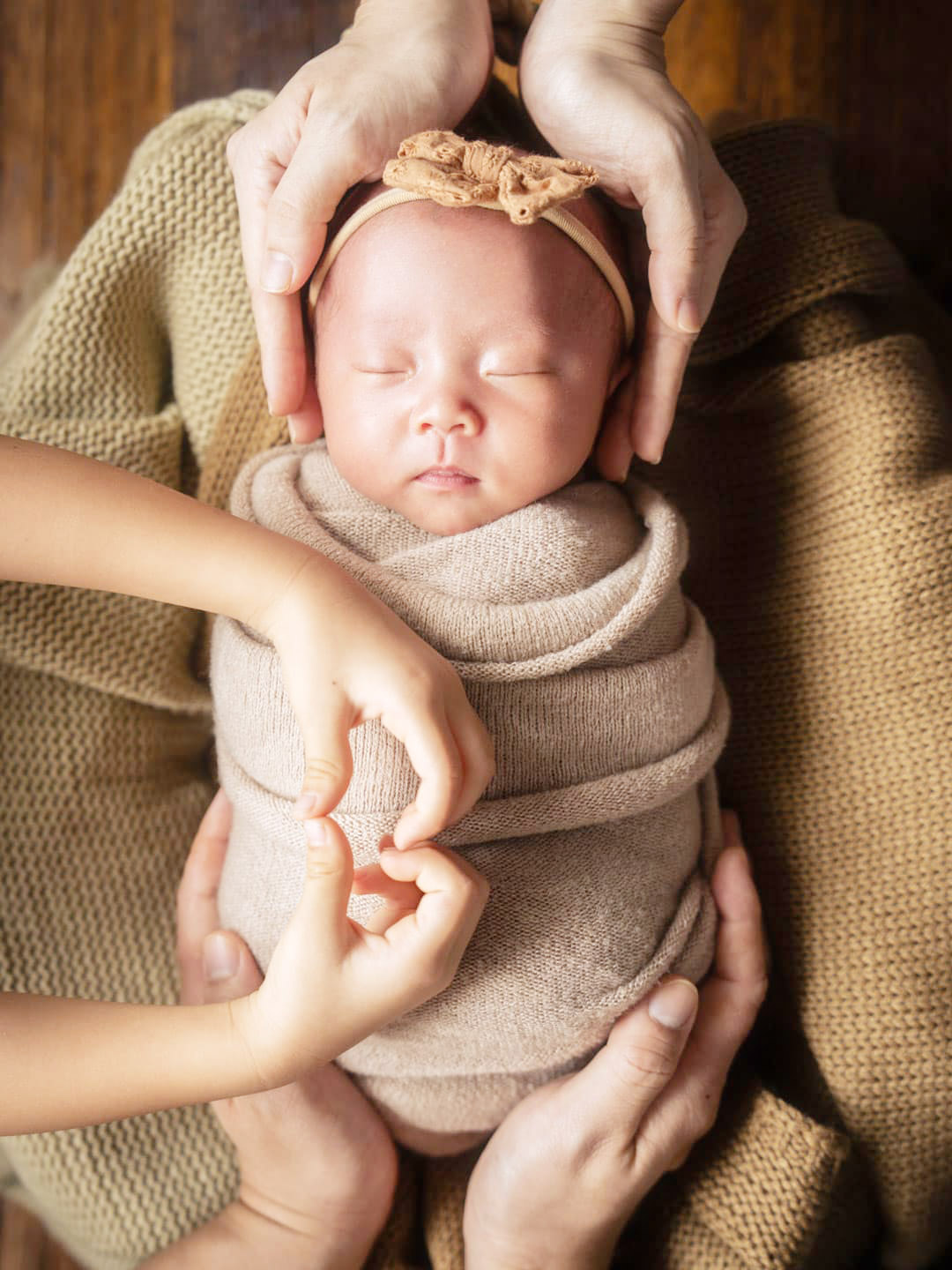 Newborn photoshoot in natural light at White Room Studio newborn photography studio, Singapore