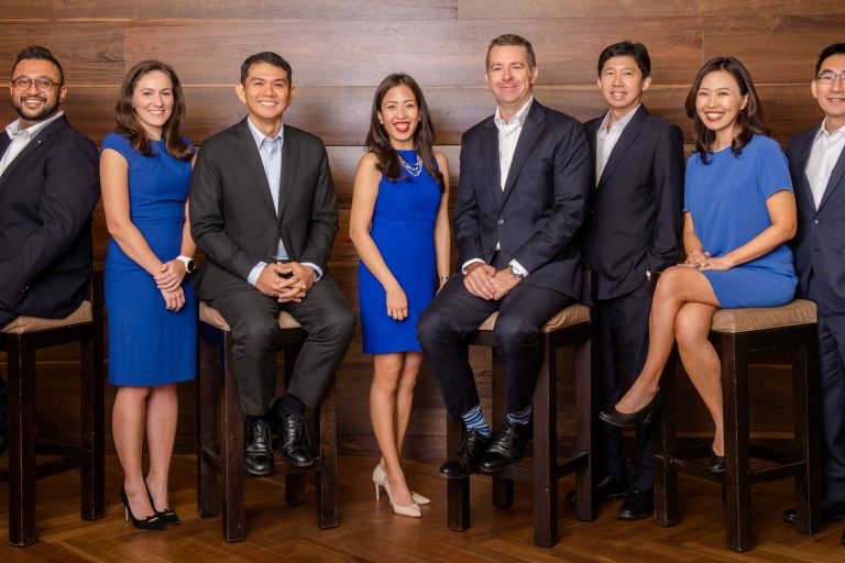 Professional corporate headshot photographed in natural light photo studio at White Room Studio, 219 River Valley Road Singapore