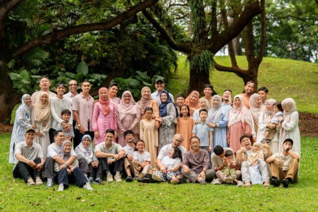 Multi-Gen Family with parents and their children with kids ages ranging from toddler to teens in a photography studio setting during an outdoor family photoshoot in Singapore. Credit: White Room Studio Pte Ltd