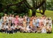 Family with parents and their children with kids ages ranging from toddler to teens in a photography studio setting during an outdoor family photoshoot in Singapore. Credit: White Room Studio Pte Ltd