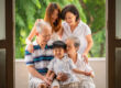 Family with parents and their toddler in a photography studio setting during an family photoshoot in Singapore. Credit: White Room Studio Pte Ltd